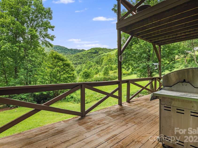 24 Cataloochee Lane, Waynesville, NC 28785.  MLS# CAR4268392, YatesRealty ID 21448. View from the deck