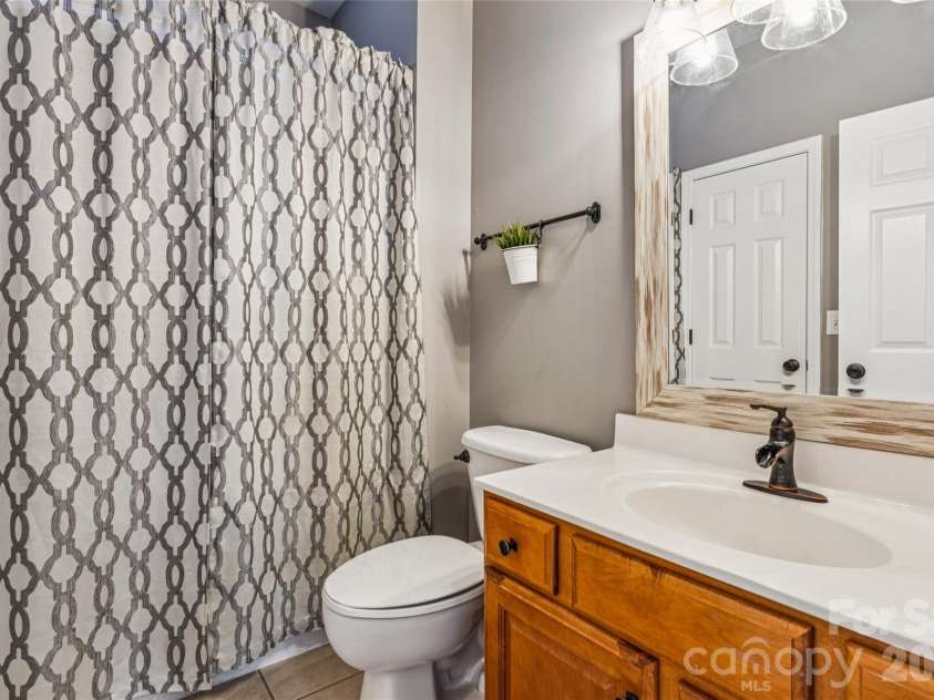 11413 Mangla Drive, Charlotte, NC 28214.  MLS# CAR4353792, YatesRealty ID 21449. Bathroom on Main