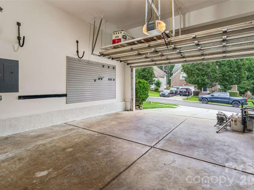 11413 Mangla Drive, Charlotte, NC 28214.  MLS# CAR4353792, YatesRealty ID 21449. Garage