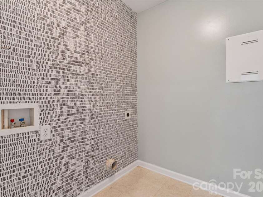 11413 Mangla Drive, Charlotte, NC 28214.  MLS# CAR4353792, YatesRealty ID 21449. Laundry Room
