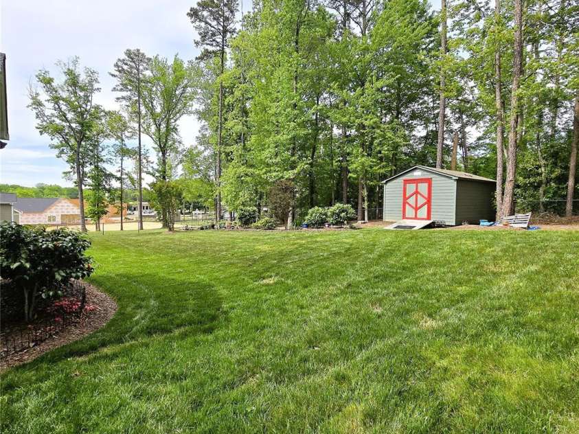 414 Fulton Drive, Kings Mountain, NC 28086.  MLS# CAR4254346, YatesRealty ID 21449. Fenced back yard with irrigation system