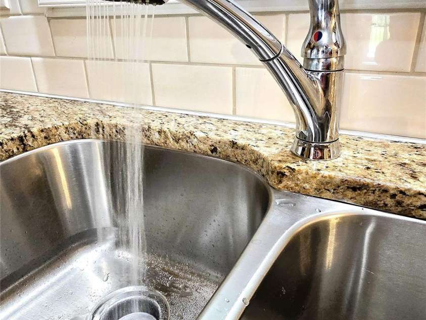 414 Fulton Drive, Kings Mountain, NC 28086.  MLS# CAR4254346, YatesRealty ID 21449. Stainless steel sink and spray faucet in kitchen