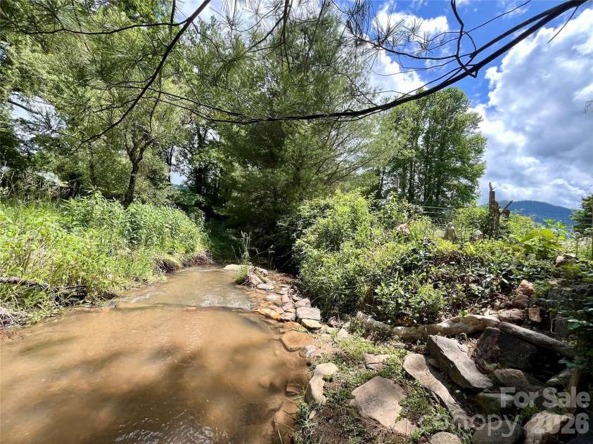 3 Taproot Trail, Barnardsville, NC 28709.  MLS# CAR4361662, YatesRealty ID 21454. Creek