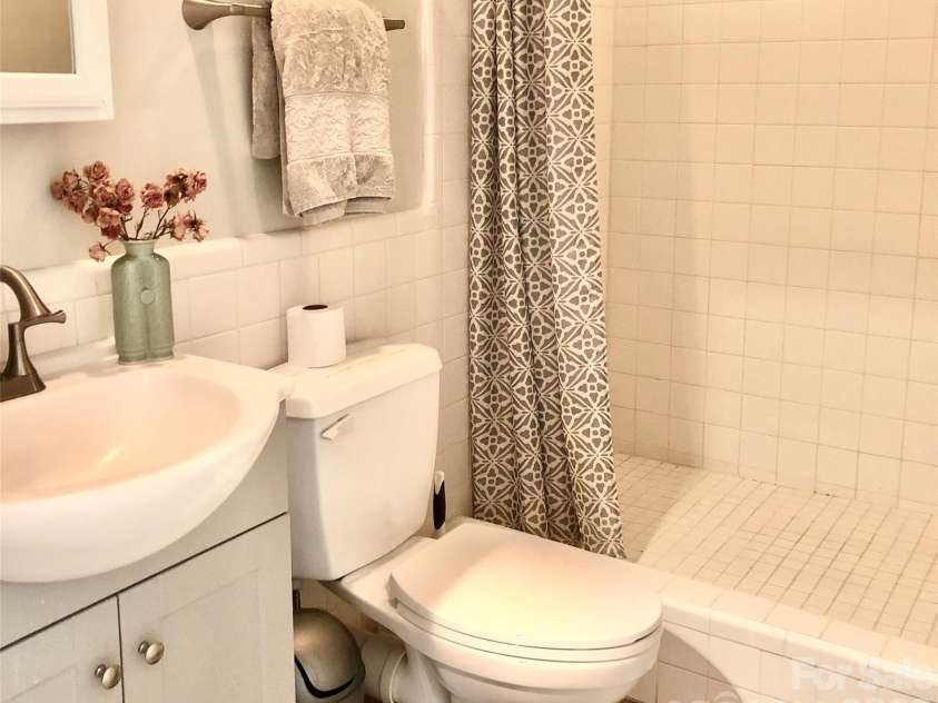 3 Taproot Trail, Barnardsville, NC 28709.  MLS# CAR4361662, YatesRealty ID 21454. Downstairs bathroom