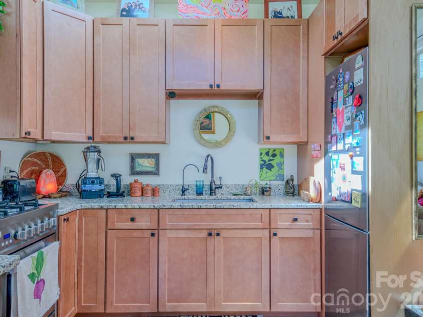 3 Taproot Trail, Barnardsville, NC 28709.  MLS# CAR4361662, YatesRealty ID 21454. Kitchen area in studio