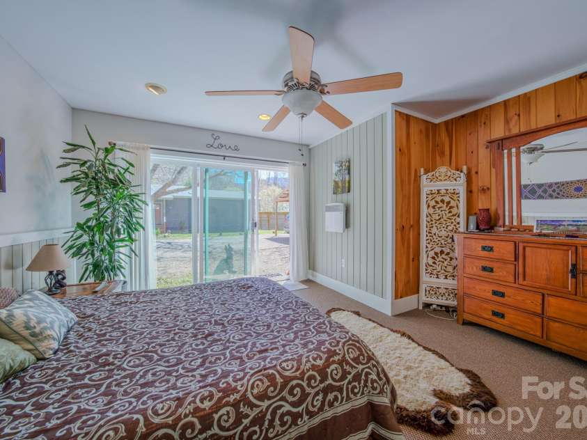 3 Taproot Trail, Barnardsville, NC 28709.  MLS# CAR4361662, YatesRealty ID 21454. Sliding doors to ourside