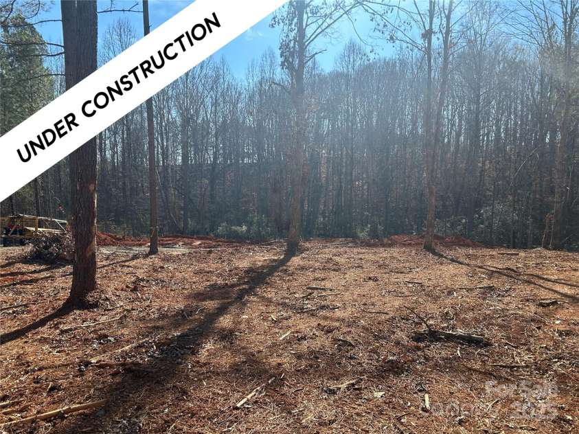 7246 Windy Ridge Drive, Iron Station, NC 28080.  MLS# CAR4314998, YatesRealty ID 2146. Foundation has started. Framing starting soon