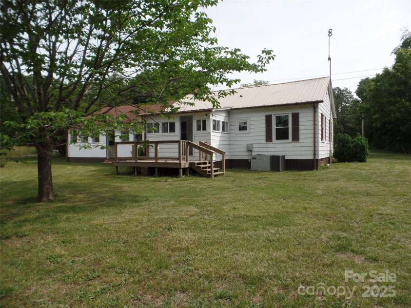 5004 King Wilkinson Road, Denver, NC 28037.  MLS# CAR4259996, YatesRealty ID 21460. Back of home and Deck