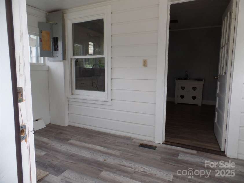 5004 King Wilkinson Road, Denver, NC 28037.  MLS# CAR4259996, YatesRealty ID 21460. Back Porch Laundry Room with Heating & Cooling