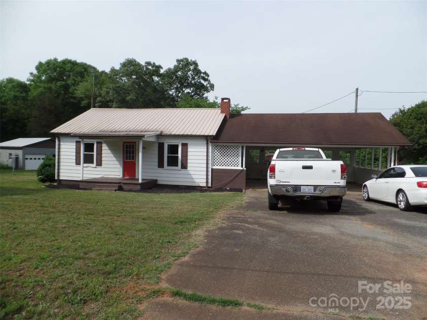 5004 King Wilkinson Road, Denver, NC 28037.  MLS# CAR4259996, YatesRealty ID 21460. Fresh Paint New Carpet Updated Plumbing Two Car Shop With Car Lift