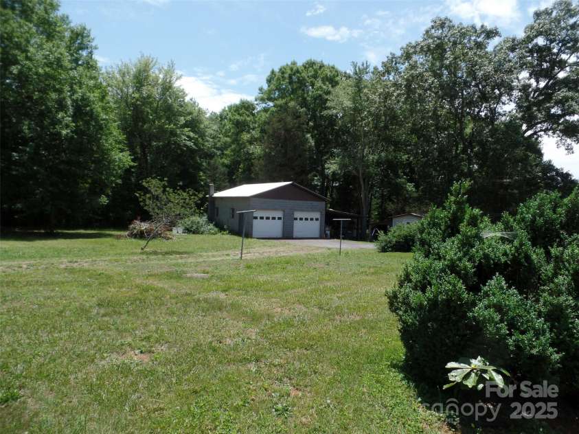5004 King Wilkinson Road, Denver, NC 28037.  MLS# CAR4259996, YatesRealty ID 21460. Garage/Shop with Car Lift