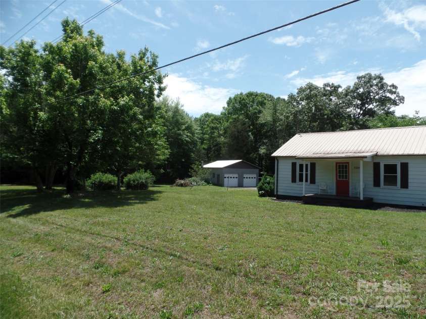 5004 King Wilkinson Road, Denver, NC 28037.  MLS# CAR4259996, YatesRealty ID 21460. Home with Garage/Shop