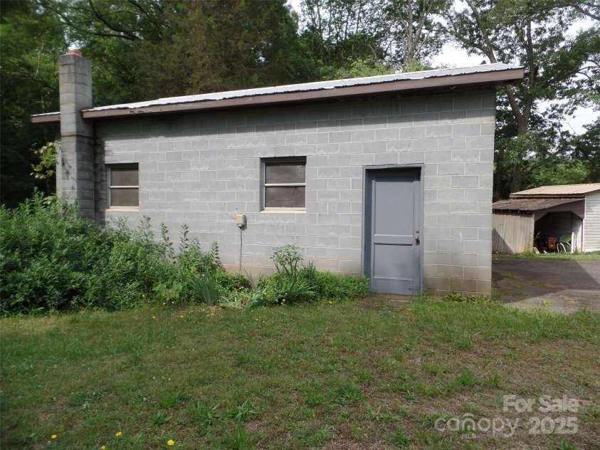 5004 King Wilkinson Road, Denver, NC 28037.  MLS# CAR4259996, YatesRealty ID 21460. Side entry Door To Garage/Shop