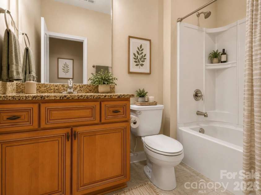 144 Hawks Landing Drive, Troutman, NC 28166.  MLS# CAR4367521, YatesRealty ID 21463. Virtually staged-hall bathroom