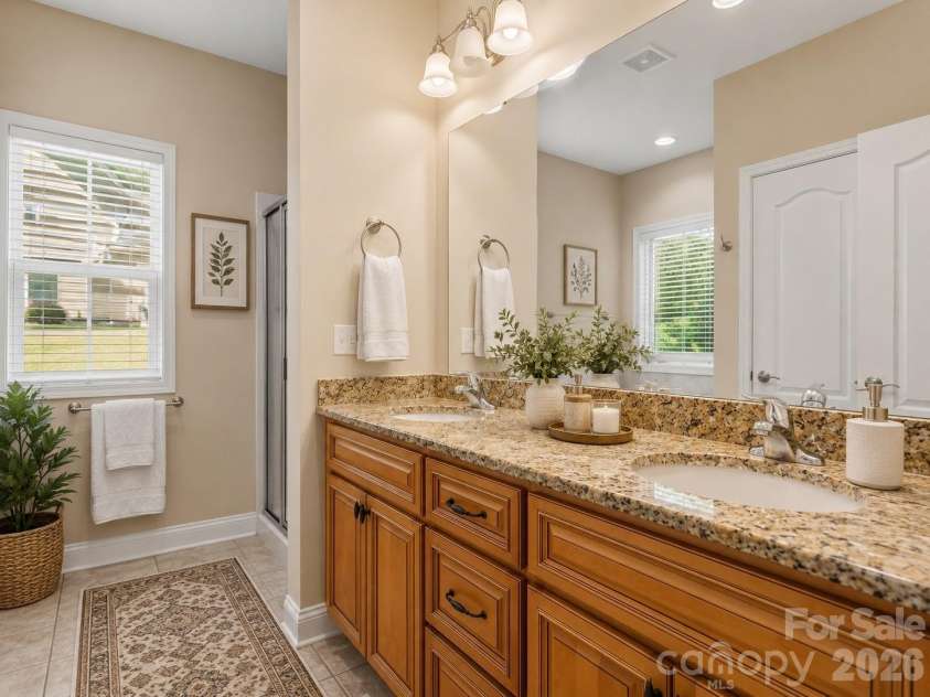 144 Hawks Landing Drive, Troutman, NC 28166.  MLS# CAR4367521, YatesRealty ID 21463. Virtually staged-primary bathroom