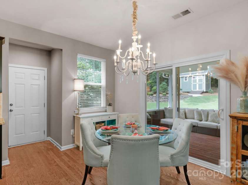 3701 Methodist Church Lane, Waxhaw, NC 28173.  MLS# CAR4270658, YatesRealty ID 21466. Breakfast nook with sliding door access to the screened porch