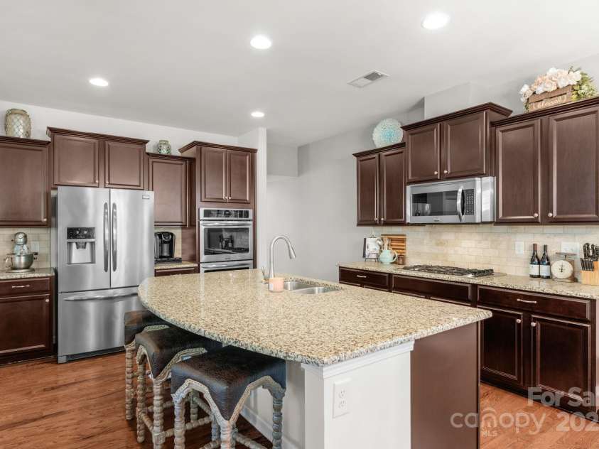 3701 Methodist Church Lane, Waxhaw, NC 28173.  MLS# CAR4270658, YatesRealty ID 21466. Gourmet kitchen with ample cabinetry and granite counters