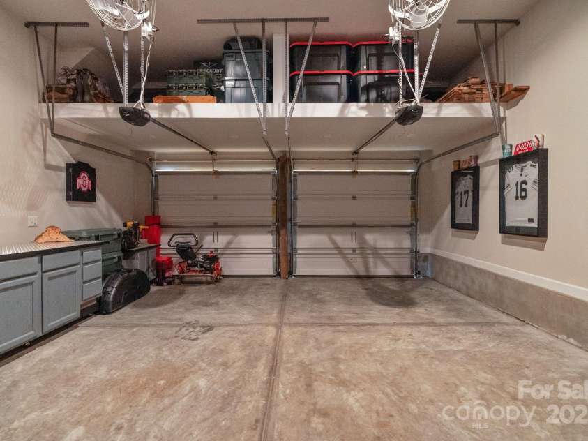 3701 Methodist Church Lane, Waxhaw, NC 28173.  MLS# CAR4270658, YatesRealty ID 21466. Spacious garage with convenient storage shelving