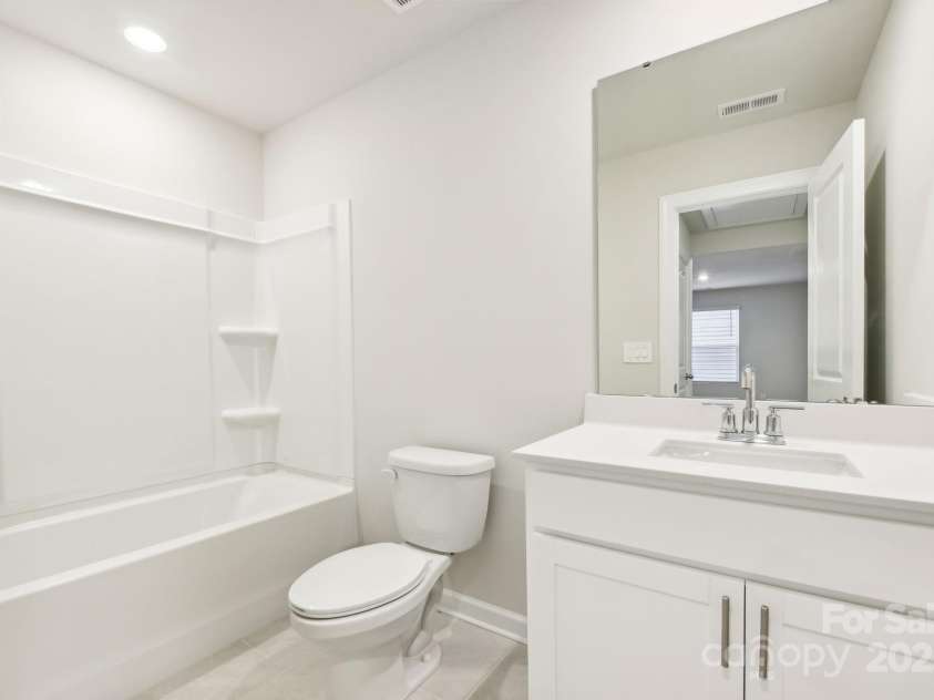 1421 Wildflower Street, Newton, NC 28658.  MLS# CAR4255807, YatesRealty ID 21468. Photo is not of the actual home, but is an inspirational photo of builder’s model home and may depict options, furnishings, and/or decorator features that are not included