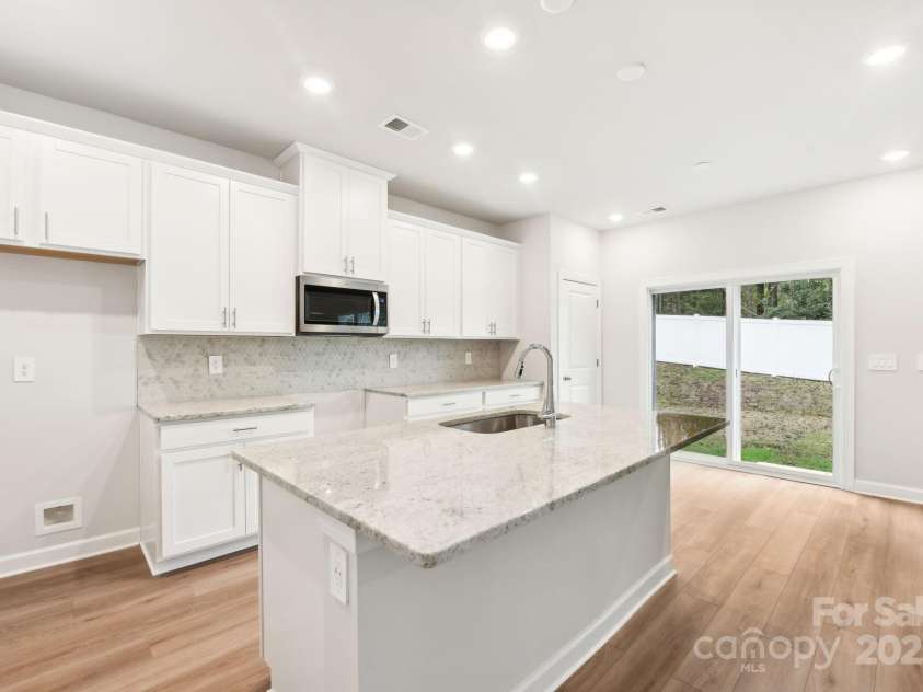 1421 Wildflower Street, Newton, NC 28658.  MLS# CAR4255807, YatesRealty ID 21468. Photo is not of the actual home, but is an inspirational photo of builder’s model home and may depict options, furnishings, and/or decorator features that are not included