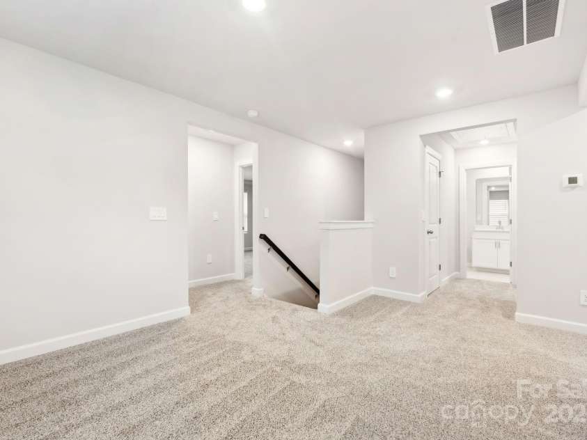 1421 Wildflower Street, Newton, NC 28658.  MLS# CAR4255807, YatesRealty ID 21468. Photo is not of the actual home, but is an inspirational photo of builder’s model home and may depict options, furnishings, and/or decorator features that are not included