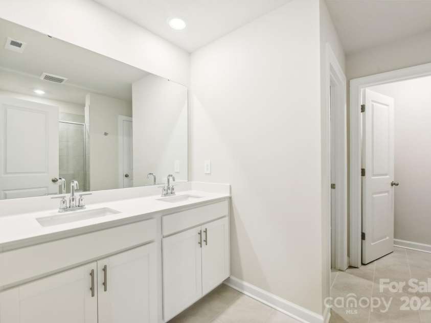 1421 Wildflower Street, Newton, NC 28658.  MLS# CAR4255807, YatesRealty ID 21468. Photo is not of the actual home, but is an inspirational photo of builder’s model home and may depict options, furnishings, and/or decorator features that are not included