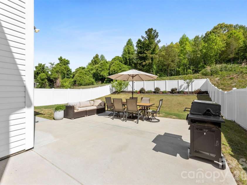 3152 Pinehills Way, Mount Holly, NC 28120.  MLS# CAR4372181, YatesRealty ID 21469. Extended Concrete Patio