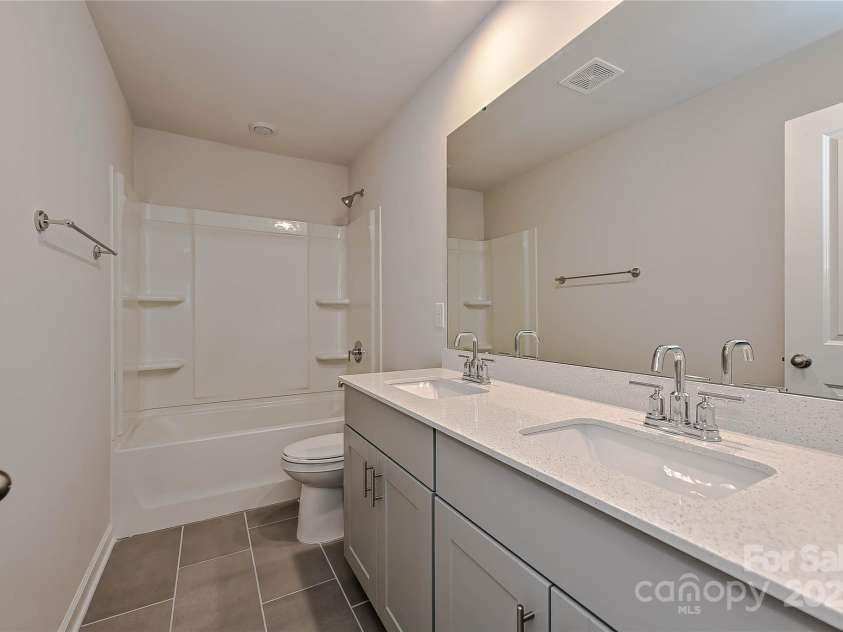 5027 Poplin Valley, Cherryville, NC 28021.  MLS# CAR4249708, YatesRealty ID 21469. Photo is not of the actual home, but is an inspirational photo of builder’s model home and may depict options, furnishings, and/or decorator features that are not included