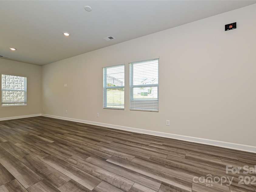 7028 Alva Terrace, Charlotte, NC 28216.  MLS# CAR4267597, YatesRealty ID 21471. Photo is not of the actual home, but is an inspirational photo of builder’s model home and may depict options, furnishings, and/or decorator features that are not included