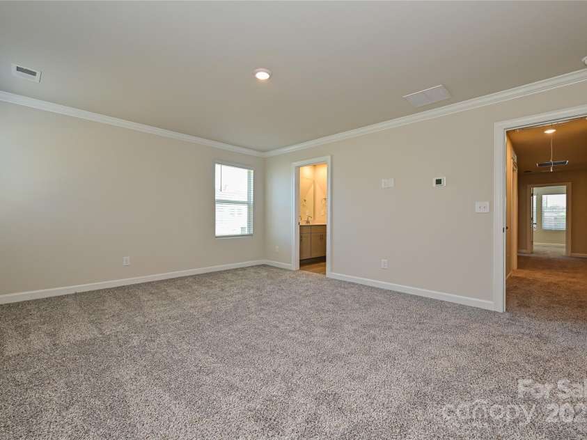 7028 Alva Terrace, Charlotte, NC 28216.  MLS# CAR4267597, YatesRealty ID 21471. Photo is not of the actual home, but is an inspirational photo of builder’s model home and may depict options, furnishings, and/or decorator features that are not included