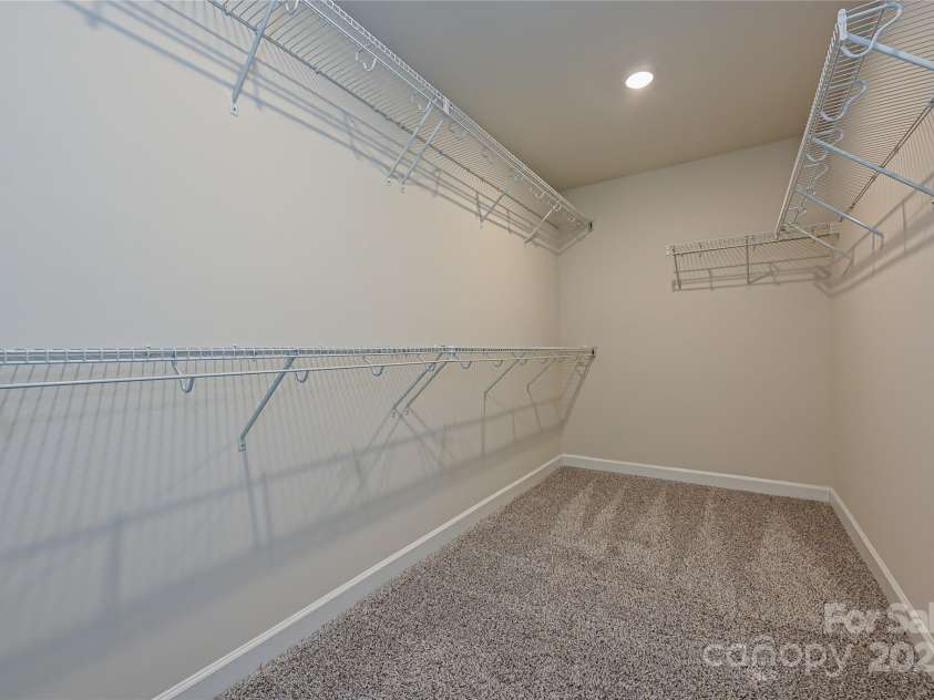 7028 Alva Terrace, Charlotte, NC 28216.  MLS# CAR4267597, YatesRealty ID 21471. Photo is not of the actual home, but is an inspirational photo of builder’s model home and may depict options, furnishings, and/or decorator features that are not included