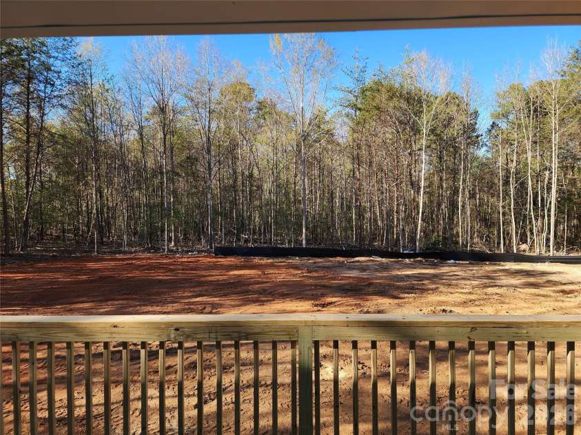 5405 Springs Road, Conover, NC 28613.  MLS# CAR4363103, YatesRealty ID 21472. Large Level Rear Yard from the Large Partial Covered Rear Deck