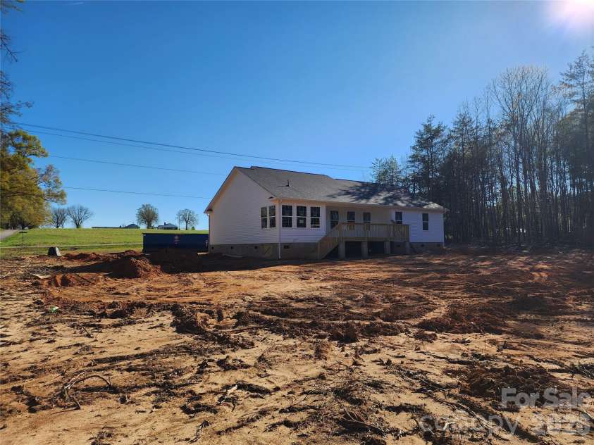 5405 Springs Road, Conover, NC 28613.  MLS# CAR4363103, YatesRealty ID 21472. Right Rear Elev w/ Partial Covered Rear  Deck and Large Rear Yard
