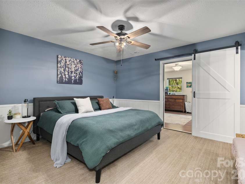 84 Chisholm Street, Saluda, NC 28773.  MLS# CAR4372070, YatesRealty ID 21473. Main Bedroom