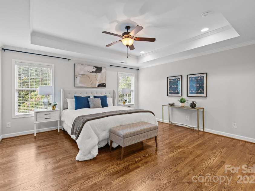 3206 Lakehurst Crossing, Matthews, NC 28104.  MLS# CAR4259492, YatesRealty ID 21479. Primary Bedroom with hardwood flooring