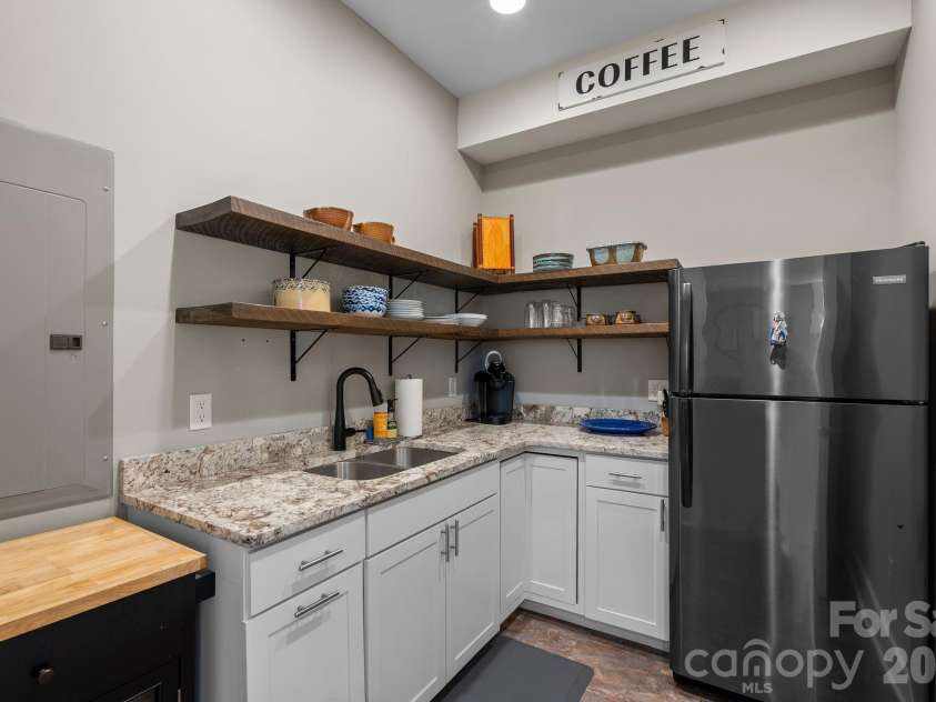 55 Vandalia Avenue, Asheville, NC 28806.  MLS# CAR4362677, YatesRealty ID 21480. Basement kithenette