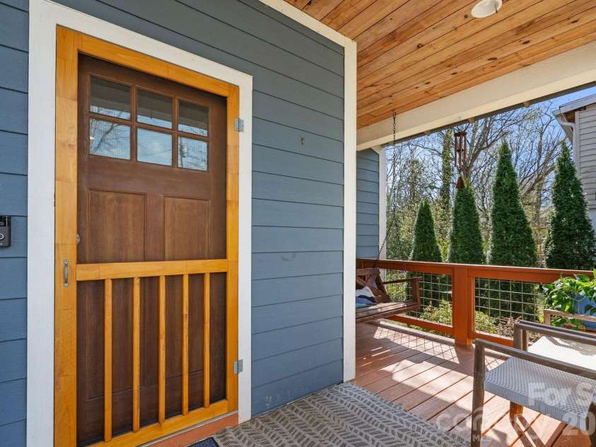 55 Vandalia Avenue, Asheville, NC 28806.  MLS# CAR4362677, YatesRealty ID 21480. Front entryway on covered porch