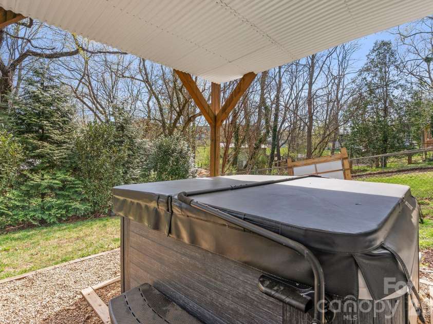 55 Vandalia Avenue, Asheville, NC 28806.  MLS# CAR4362677, YatesRealty ID 21480. Hot tub accessed from lower level - covered & private