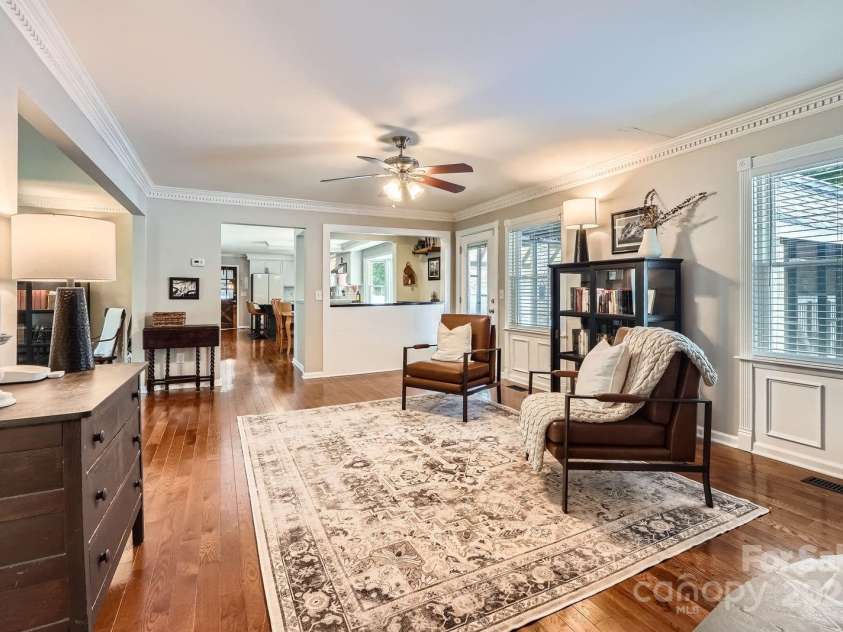 1175 18th Avenue, Hickory, NC 28601.  MLS# CAR4267840, YatesRealty ID 21483. The layout provides excellent flow from the kitchen and informal dining areas, making it ideal for both everyday living and entertaining. French doors offer direct access to the outdoor living space, seamlessly connecting i