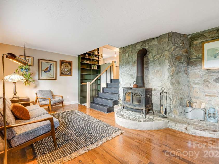 90 Reed Road, Asheville, NC 28805.  MLS# CAR4271385, YatesRealty ID 21485. Perfect Spot to Cozy Up on Chilly Days