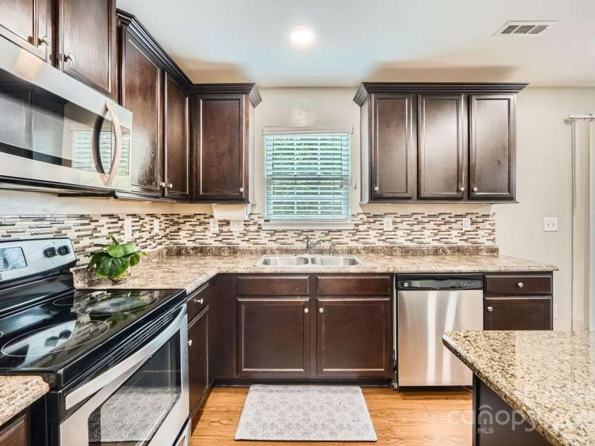 4151 Granite Street, Midland, NC 28107.  MLS# CAR4269679, YatesRealty ID 21486. 