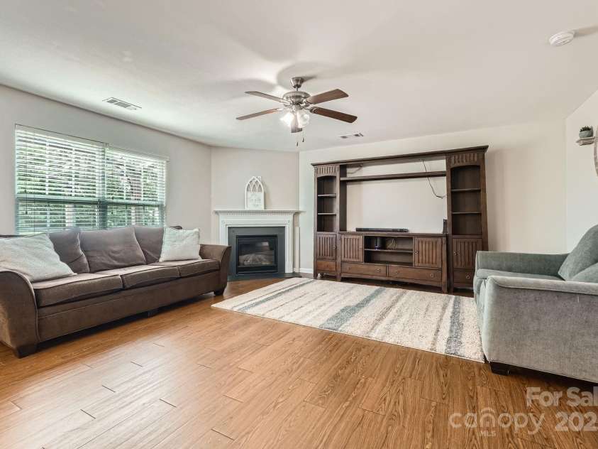 4151 Granite Street, Midland, NC 28107.  MLS# CAR4269679, YatesRealty ID 21486. Family room