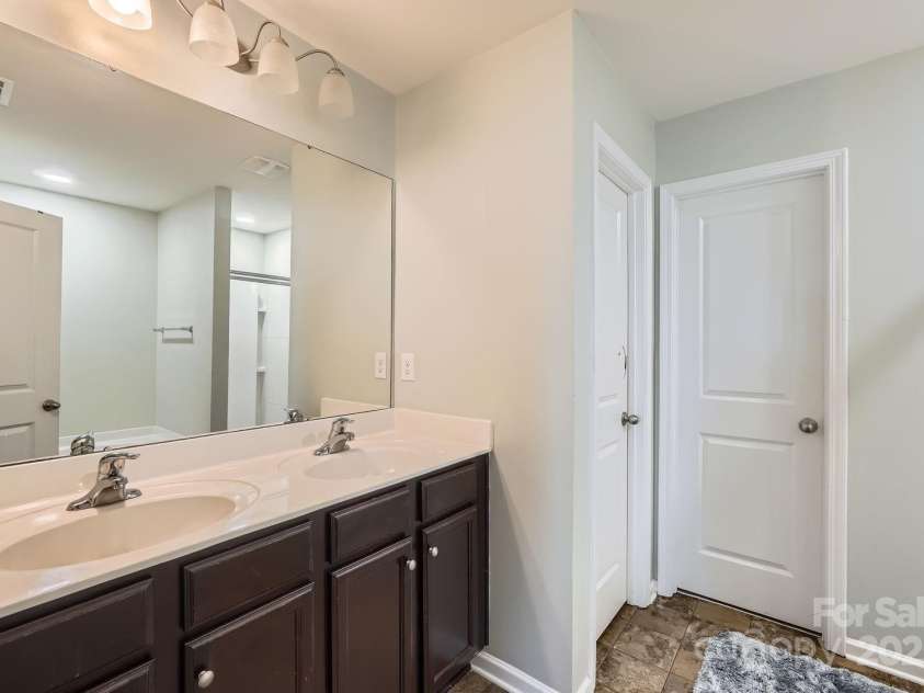 4151 Granite Street, Midland, NC 28107.  MLS# CAR4269679, YatesRealty ID 21486. Primary bath