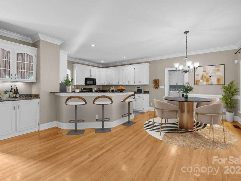 2608 Carmarthen Court, Matthews, NC 28104.  MLS# CAR4252626, YatesRealty ID 21488. Kitchen and Breakfast room Virtually Staged