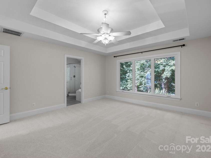 2608 Carmarthen Court, Matthews, NC 28104.  MLS# CAR4252626, YatesRealty ID 21488. Primary Bedroom