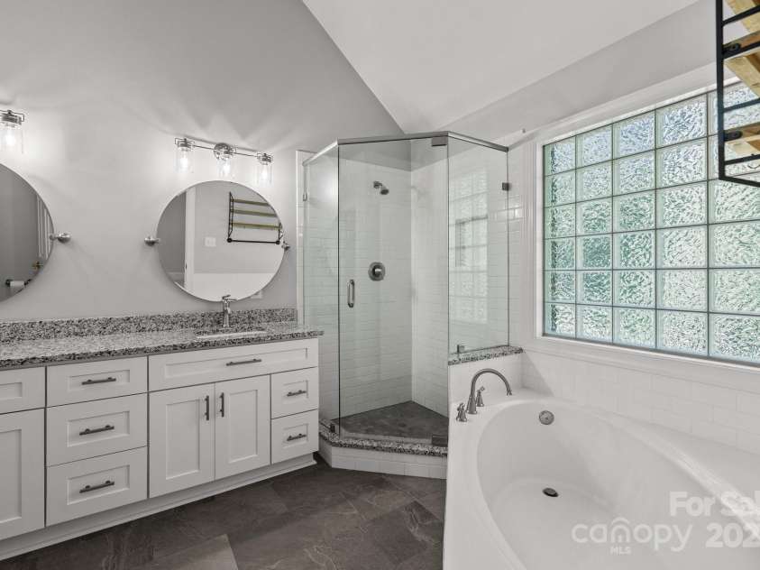 2608 Carmarthen Court, Matthews, NC 28104.  MLS# CAR4252626, YatesRealty ID 21488. Remodeled Primary Bathroom