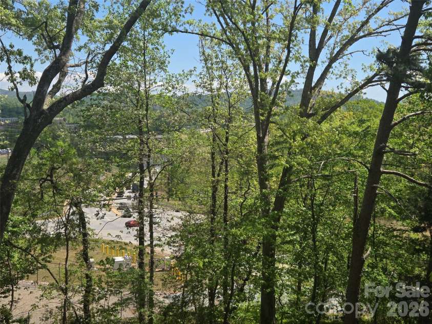 502 Long Shoals Road, Arden, NC 28704.  MLS# CAR4372104, YatesRealty ID 21492. 
