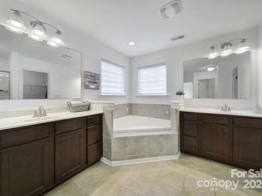 9029 Woodview Court, Fort Mill, SC 29707.  MLS# CAR4303273, YatesRealty ID 21492. Master Bath with Double Vanities for Added Convenience