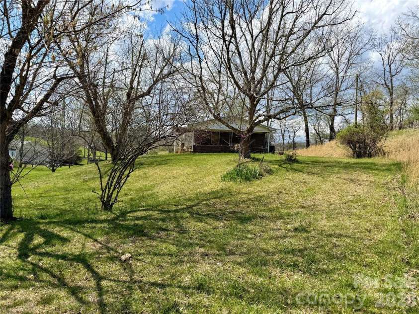 637 Fletcher Martin Road, Alexander, NC 28701.  MLS# CAR4365273, YatesRealty ID 21494. 
