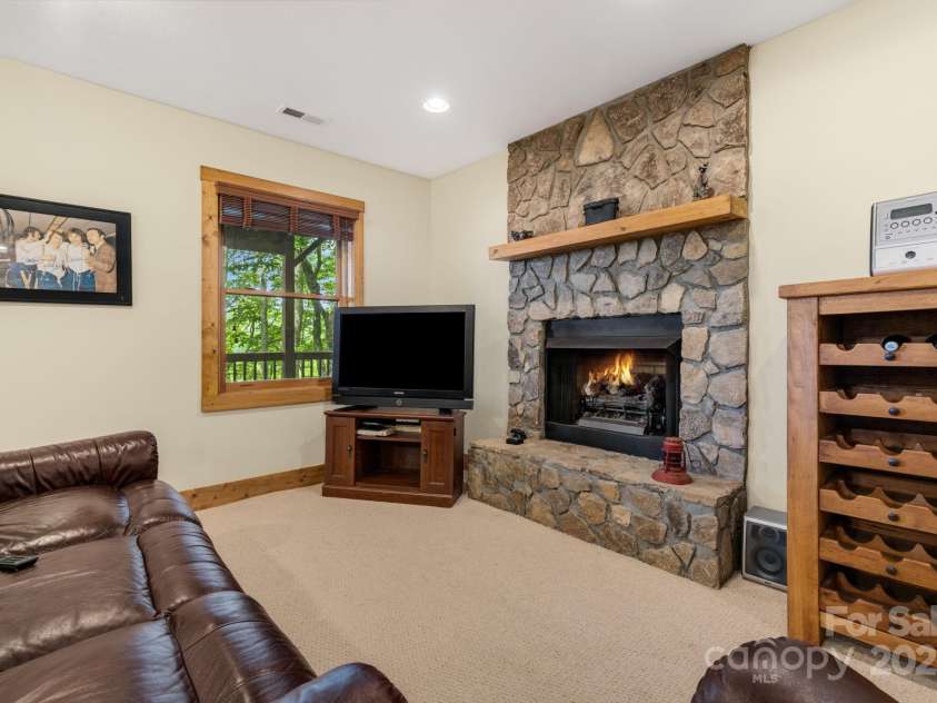 587 Grouse Thicket Road, Mars Hill, NC 28754.  MLS# CAR4269206, YatesRealty ID 21495. 2nd fireplace